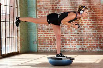 Lindsey Vonn shows athletics exercise.