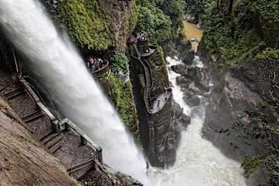 Overlooking the tourist route alongside Pailon del Diablo Waterfall in Ecuador, as popular but very wet attraction