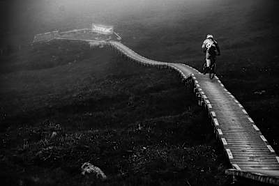 I had a scaphoid fracture and couldn’t race so I was taking pictures instead. This is maybe not the best action shot but I like the way the bridge creates a line down the track and out of the picture.