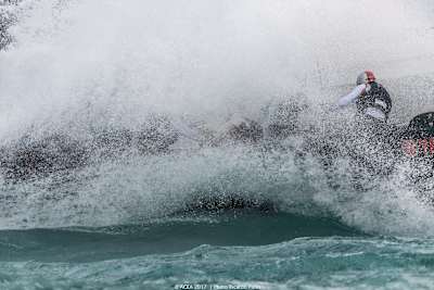 Soft Bank Team Japan hit by a massive wave in Louis Vuitton America's Cup Challenger playoff semi finals in Bermuda.