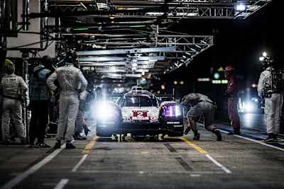 Your Le Mans 24 Hours 2017 winners, Porsche The Porsche team make a pit stop during the night at the Le Mans 24 Hours endurance race in Le Mans, France on June 17, 2017.