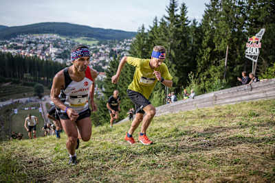 Ahmet Arslan and Anton Palzer make their way up the 400 metre ski-jump at Hochfirstschanze during the final of the Red Bull 400 World Championship at Titisee-Neustadt, on July 15th 2017.