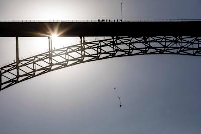 As the 'chute opens, four Gs of shock halt a fall Miles Daisher's overall goal is 5,000 BASE jumps.