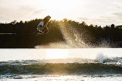 Mike Dowdy wakeboards on Lake Superior along the shores of northern Wisconsin, USA on July 09, 2017.