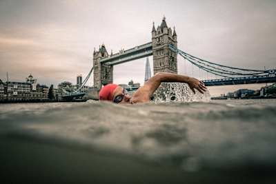 Swimming in front of the Tower bridge in London.