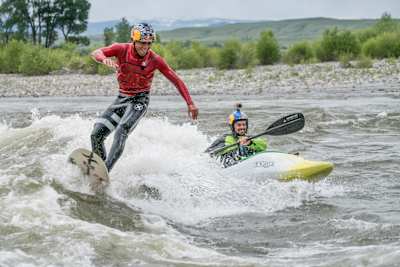 The two Red Bull athletes ride together in the Yellowstone River.