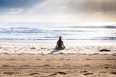 Yoga and surfing can help you live a happier, healthier life