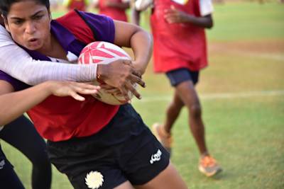 The women's team makes up in effort what it lacks in size and strength