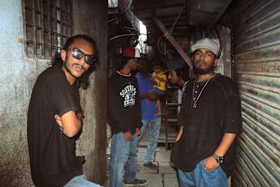 7Bantai'Z at a lane in Block No 12 that doesn't have much light but they know their way around.