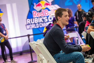Feliks Zemdegs practices while watching other competitors at Rubik's Cube World Championship in Boston, Massachusetts, USA on September 22, 2018