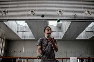 Gary Hunt of the UK juggles in the athletes room at the Opera House at the fifth stop at the Red Bull Cliff Diving World Series in Copenhagen, Denmark on August 23, 2018.