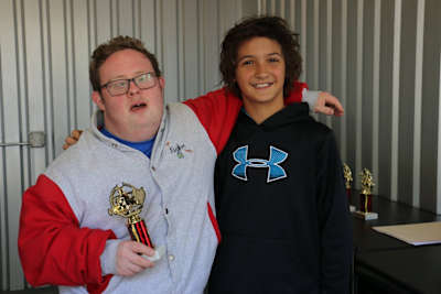 Jak in 2017 with his "Fast Friend" Nathan at Speedsportz Racing Park in New Caney, Texas. Nathan was attending one of Jak's charity events for special needs kids, Fast Friends Speed School