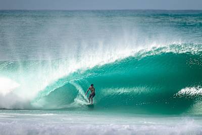 Barron Mamiya catching waves at Log Cabins, USA