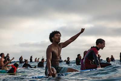 Surfers at the paddle out