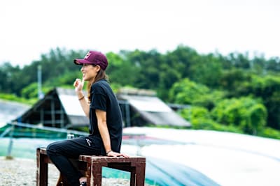 Miyabi Onitsuka with the airbag training facility in the background