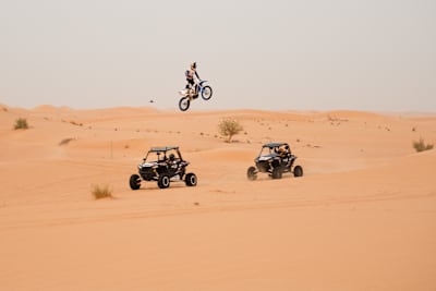 Mohammed Balooshi jumps over Shreyas Iyer and Chirag Suri