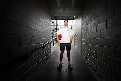 Christian Petracca stands in the corridor to the field 