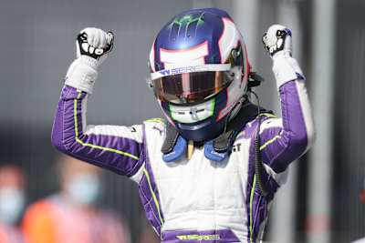 Jamie Chadwick celebrating winning the Grand Prix of Austria