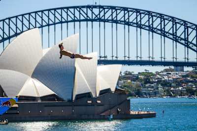 Aidan Heslop of the UK dives from the 27.5 metre platform during the first competition day of the eighth and final stop of the Red Bull Cliff Diving World Series in Sydney