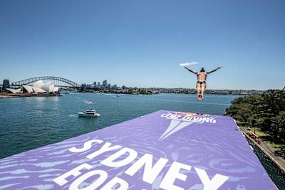 Nikita Fedotov dives from the iconic Red Bull Cliff Diving World Series platform in Sydney on Day 1 of the last stop of 2024