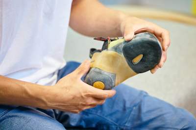 Sorato Anraku displays his climbing shoes.