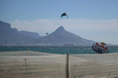 Cohan van Dijk catches massive air over the Cape Town coastline during day 3 of Red Bull King Of The Air 2025, showcasing jaw-dropping kiteboarding action against South Africa’s iconic landscape