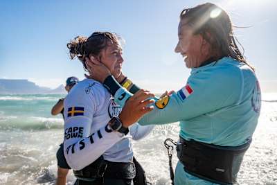 Nathalie Lambrecht celebrates a triumphant win during Day 3 of Red Bull King Of The Air 2025 on the windswept shores of Cape Town, South Africa, bringing excitement to the world of kiteboarding