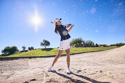 Rose Zhang practicing bunker play