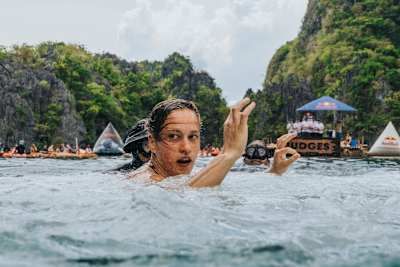 Nelli Chukanivska emerges after her 21-metre dive at the Big Lagoon during the 2025 Red Bull Cliff Diving World Series in El Nido, Philippines