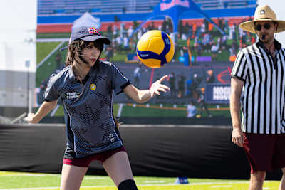 Emily 'Emiru' Schunk serves the volleyball at Streamer Games