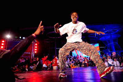 Aimsley delivers an electrifying performance at the Red Bull Dance Your Style National Final 2025 in Century City, Cape Town, showcasing bold street dance moves to a packed crowd