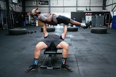 Siya Kolisi performs a partner strength exercise with Rayno Nel during filming of What We Know Season 1, Episode 4 in Port Elizabeth, South Africa, on 4 February 2026