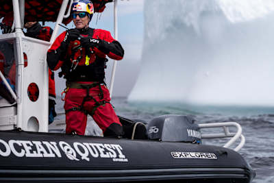 Will Gadd eyeing the iceberg from the boat