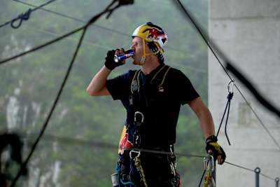 Thomas Van Tonder drinks Red Bull while preparing for Red Bull Bridge Bars at Bloukrans Bridge in South Africa on 17 March 2026
