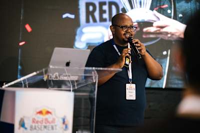 Judge Mixo Ngoveni speaks at the Red Bull Basement National Final 2026, held at Innovation City in Cape Town, South Africa, inspiring future innovators to push boundaries