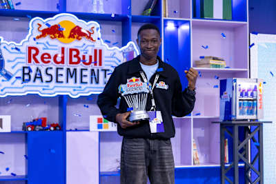 On April 4, 2026, the victorious innovator at Red Bull Basement National Final Nigeria at The Zone, Gbagada, Lagos, proudly displays their trophy amid confetti and energy