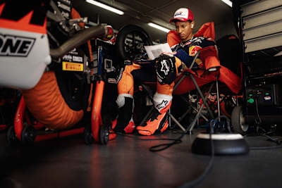 Sullivan Mounsey checking his track notes in the garage 2026