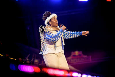 Singer Msaki delivers a powerful live performance at Red Bull Symphonic in Johannesburg, South Africa, on 14 June 2026, under dramatic stage lighting and electric energy
