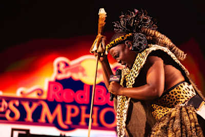 On 13 June 2026, Mnqobi Yazo delivers a powerful performance during Red Bull Symphonic at Montecasino in Johannesburg, South Africa, merging tradition with Red Bull's bold energy