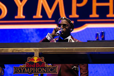 Dlala Thukzin electrifies the stage during Red Bull Symphonic in Johannesburg, South Africa, on 14 June 2026, merging dynamic energy with a bold symphonic backdrop