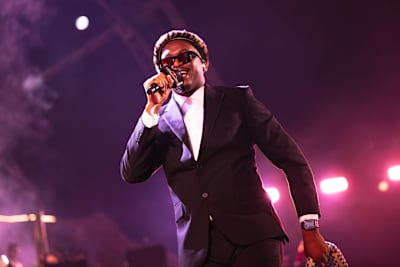 Mthunzi performs live under vibrant lights during Red Bull Symphonic at Montecasino, Johannesburg, South Africa, on June 14, 2026, delivering an electrifying and adventurous show