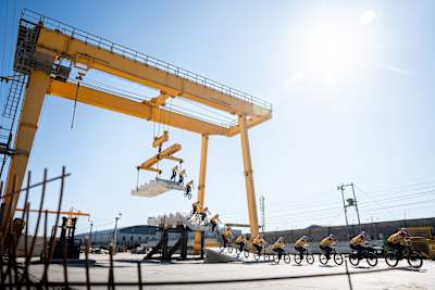 In 2026, Murray Loubser showcases daring BMX skills at the Red Bull Cape Concrete Social First Project, jumping under cranes in Cape Town, South Africa