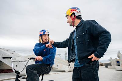 Red Bull athletes Murray Loubser and George Ntavoutian share a fist bump during the Red Bull Cape Concrete Social First Project in Cape Town, South Africa, May 2026