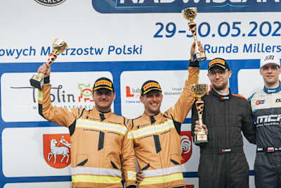 Co-driver Martynek and Górny in celebration mode