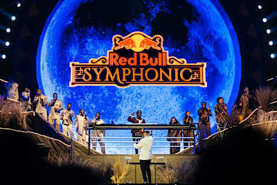 Dlala Thukzin and Choir deliver an electrifying performance at Red Bull Symphonic in Johannesburg, South Africa, on June 13, 2026, set against a stunning symphonic backdrop