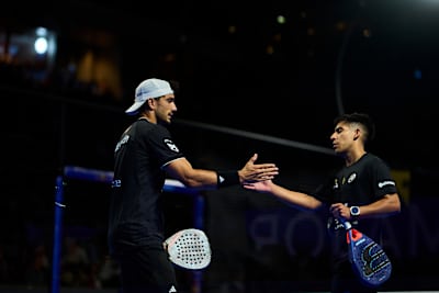 Alejandro Galán and Federico Chingotto shake hands during the 2026 Premier Padel Major Paris semi-finals in Paris, France, as the intense match reaches its climax