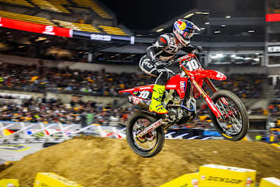 Chance Hymas competing under stadium lights