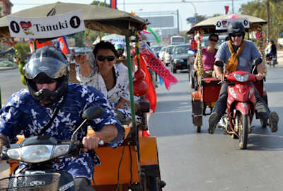 Take Cambodia by rickshaw with Large Minority.