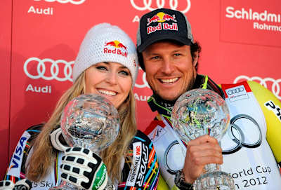 The Super-G winners of 2011-12, Lindsey Vonn and Aksel Lund Svindal, receive the globe at Schladming, Austria, on 15 March 2012.