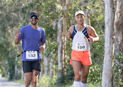 Shubham Kajale alongside another participant at Ultraman Australia 2018